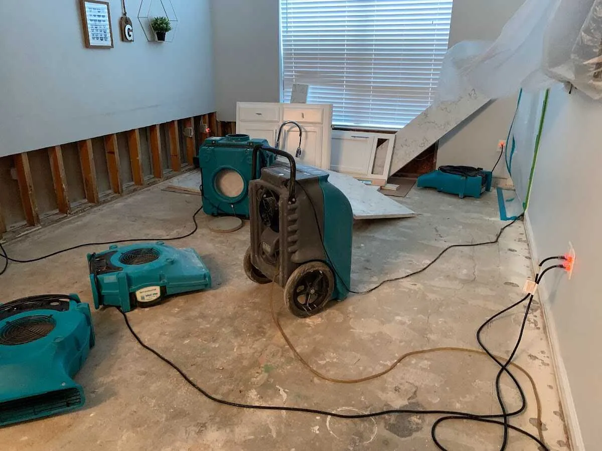 Dehumidifier in flood-cut room for Water Damage Restoration in Parkville